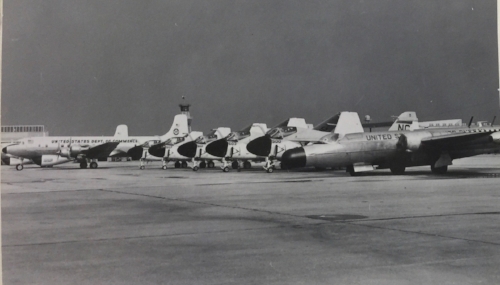 The Stormfury flightline. From right to left, a WB-57, five A-6s, and two DC-6s gravid with radar.