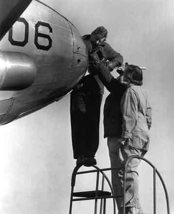 Joanne Simpson, her back to the camera, is present but elusively visible in the AMS’s Tape Recorded Interview Project. Other women are missing entirely. Image Source:  NASA History Office